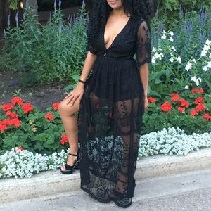 Black romper with lace covering